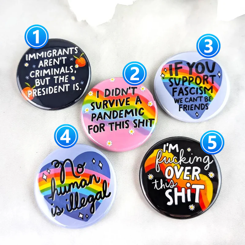 No Human Is Illegal Pinback Button